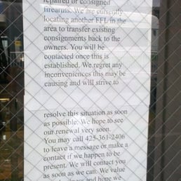 Photo of House of Guns - Edmonds, WA, United States. Sign on the door 2-12-11