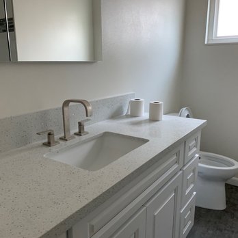 Rafu Construction - a bathroom with a sink and toilet - General Contractors Near Me - Monterey Park, California Rafu Construction - a bathroom with a sink and toilet - General Contractors Near Me - Monterey Park, California