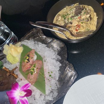 Myn-Tu - Wagyu Truffle Nigiri $18/ each piece (L) & Haute Living Truffle Spaghetti (R) - Asian Fusion Near Me - Miami Beach, Florida