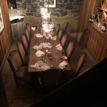 Sette Luna - a dining room with a table and chairs - Italian Near Me - Easton, Pennsylvania Sette Luna - a dining room with a table and chairs - Italian Near Me - Easton, Pennsylvania