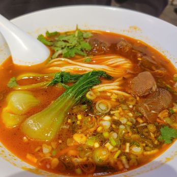 Juicy Dumpling Factory - His spicy beef noodle soup. Tasty, would have liked more broth though. - Chinese Near Me - Redondo Beach, California Juicy Dumpling Factory - His spicy beef noodle soup. Tasty, would have liked more broth though. - Chinese Near Me - Redondo Beach, California