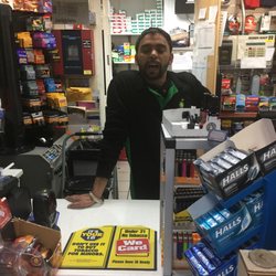 Bp Gas Station - U buy lottery tickets all the time here u pay ur money and they cannot cash here he showing costumers middle his middle finger