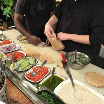 Miznon - Sit at the counter and watch them stuff the pitas - Middle Eastern Near Me - Paris, 75