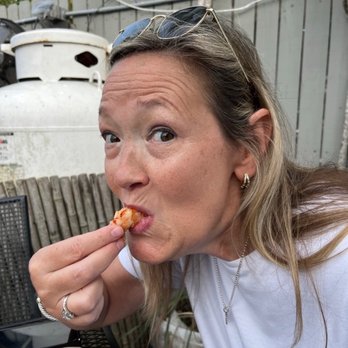 Wahoo's Bayside Pub and Grill - Slurping down those juicy red shrimp - Seafood Near Me - Redingtn Shor, Florida Wahoo's Bayside Pub and Grill - Slurping down those juicy red shrimp - Seafood Near Me - Redingtn Shor, Florida