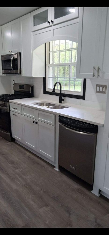 Slide of JS Roofing Group