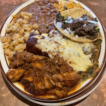 La Tertulia - Combo Plate: carne adovada, enchilada, tamale, taco served with posole, Spanish rice & pinto beans - New Mexican Cuisine Near Me - Tulsa, Oklahoma La Tertulia - Combo Plate: carne adovada, enchilada, tamale, taco served with posole, Spanish rice & pinto beans - New Mexican Cuisine Near Me - Tulsa, Oklahoma