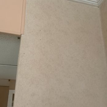Gaido's Seaside Inn - Gnats on the wall (black dots) - Hotels Near Me - Galveston, Texas