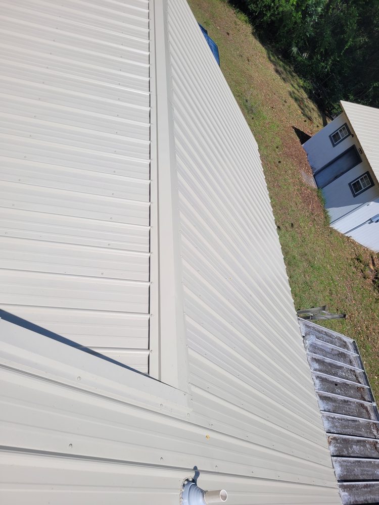 Slide of Moore Elite Roofing