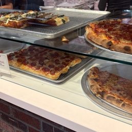 Pizzas by the slice Pizzas by the slice