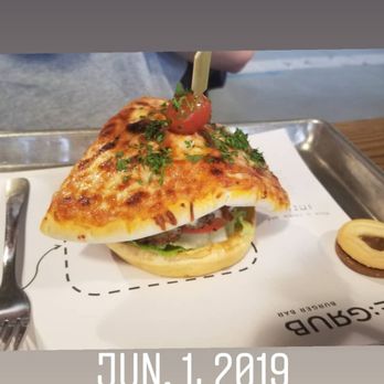 Regrub - a picture of a sandwich on a plate - Burgers Near Me - Calgary, Alberta