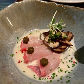COYA - Hiramasa a la Trufa Tiradito (kingfish, dashi, truffle, mushrooms, chives) - Peruvian Near Me - London, XGL COYA - Hiramasa a la Trufa Tiradito (kingfish, dashi, truffle, mushrooms, chives) - Peruvian Near Me - London, XGL