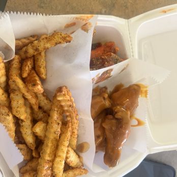 Touch Down Wings - Buffalo lemon pepper/ honey gold & Cajun fries - Chicken Wings Near Me - Garland, Texas Touch Down Wings - Buffalo lemon pepper/ honey gold & Cajun fries - Chicken Wings Near Me - Garland, Texas