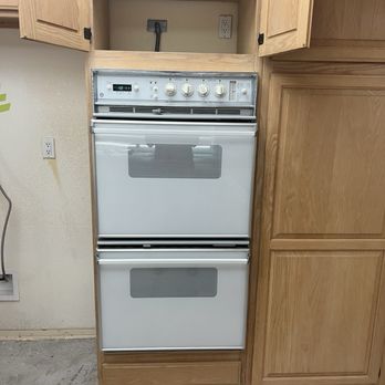 Adam’s Cabinet Installation - We replaced a double oven with an oven-microwave combo. The new appliance left a 10-inch gap below the bottom of the new oven. - Cabinetry Near Me - Anaheim, California