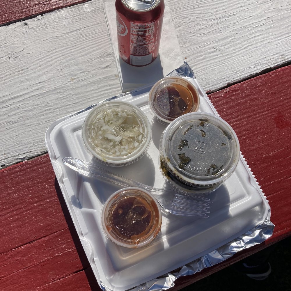 Slo & Lo BBQ - a tray of condiments and a can of beer - Food Stands Near Me Slo & Lo BBQ - a tray of condiments and a can of beer - Food Stands Near Me