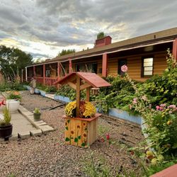 Loyal Duke Lodge - Building is U shaped with a picturesque courtyard that includes a pool and hot tub.