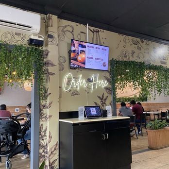 Aroma Cafe - Seating area. They will bring the food to you if you eat in. - Colombian Near Me - Springfield, Virginia