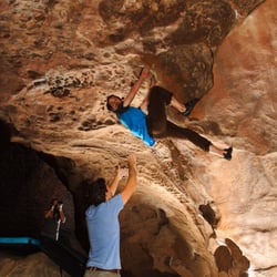 Blue Lizard Climbing and Yoga - Steve Marek working Dry Heaves, Hueco Tanks.