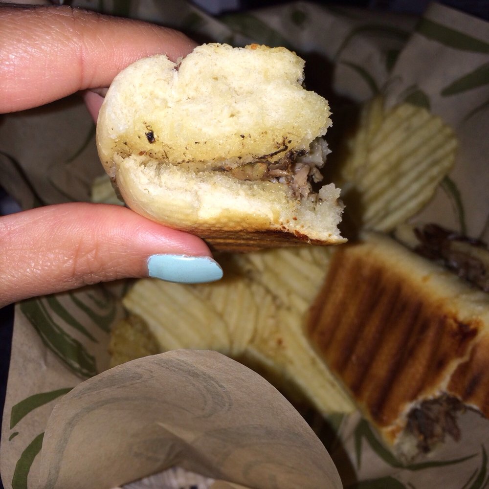 SADDEST STEAK SANDWICH EVER MADE: One half of the sandwich has tasteless meat, the other side has crumbs of tasteless meat. Hooray!