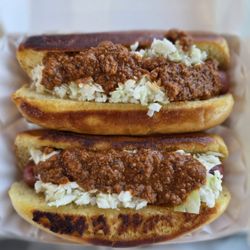 2 dog combo w/slaw, chili & cheese sauce.
