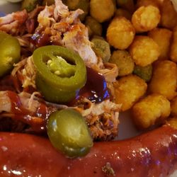 Sauced Hogs BBQ Bar & Grill - Smoked sausage, pulled pork, tots, okra