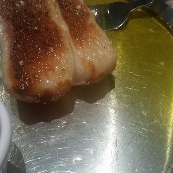 Impellizzeri's Pizza - Breadsticks swimming in melted butter - Pizza Near Me - Louisville, Kentucky Impellizzeri's Pizza - Breadsticks swimming in melted butter - Pizza Near Me - Louisville, Kentucky
