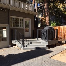 Worth Renovations - After - New 100 sq. ft. deck with grilling space on the rear of a 1908 Denver Square home.