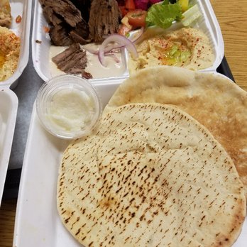 Zankou Chicken - Tri-tip shawerma with hummus, pitas, tahini sauce, garlic sauce and radish/tomatoe/peppers. - Mediterranean Near Me - Anaheim, California Zankou Chicken - Tri-tip shawerma with hummus, pitas, tahini sauce, garlic sauce and radish/tomatoe/peppers. - Mediterranean Near Me - Anaheim, California
