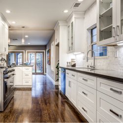 Kits Kitchen Bath & Floors - White shaker cabinets on dark hardwood floors