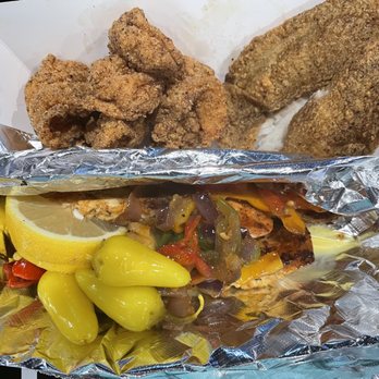Fishhook Seafood - Ontario Mills - Fried Shrimp & 3 Fish combo: grilled Mahi-mahi, grilled Salmon, & Fried Tilapia and sauteed veggies. - Southern Near Me - Ontario, California Fishhook Seafood - Ontario Mills - Fried Shrimp & 3 Fish combo: grilled Mahi-mahi, grilled Salmon, & Fried Tilapia and sauteed veggies. - Southern Near Me - Ontario, California