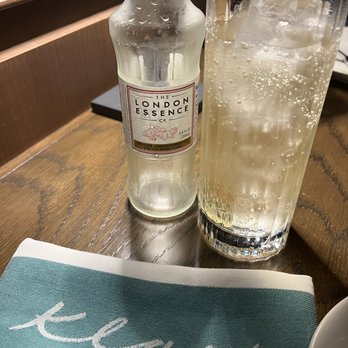 Klaw Miami - Klaw napkin and glass of ginger ale. - Steakhouses Near Me - Miami, Florida