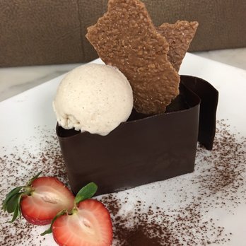 Fiorino Ristorante & Bar - Flourless chocolate coconut cake served with gelato- So delicious! - Italian Near Me - Summit, New Jersey Fiorino Ristorante & Bar - Flourless chocolate coconut cake served with gelato- So delicious! - Italian Near Me - Summit, New Jersey
