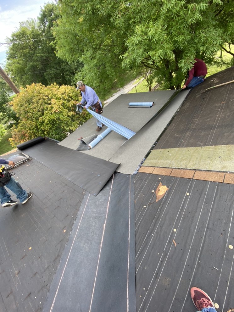 Slide of Holguin Roofing & Exteriors