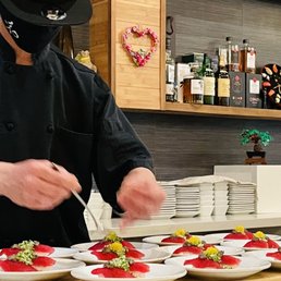 Chef Kaz hard at work prepping the next dish.