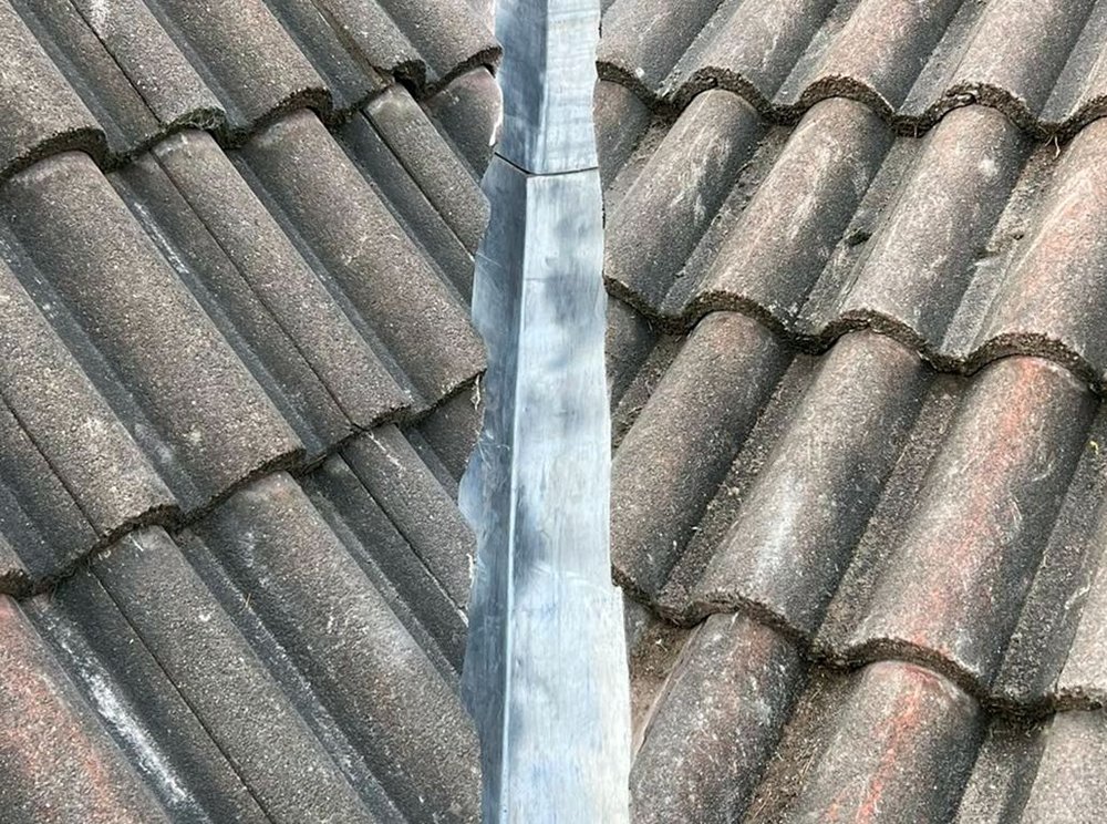 Slide of Quail Hill Roofing