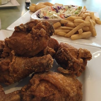 Arepas, Café & More - The crispy chicken. It comes in a combo with fries slaw and little corn cake bites - Venezuelan Near Me - Altamonte Springs, Florida Arepas, Café & More - The crispy chicken. It comes in a combo with fries slaw and little corn cake bites - Venezuelan Near Me - Altamonte Springs, Florida