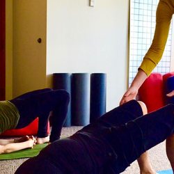 Rooted & Reaching Wellness - Movement re-education through Ashtanga Yoga, and functional movement.
