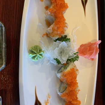 Village Sushi - a platter of sushi on a wooden table - Sushi Bars Near Me - Surrey, British Columbia Village Sushi - a platter of sushi on a wooden table - Sushi Bars Near Me - Surrey, British Columbia