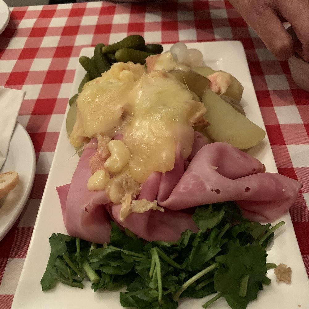 Raclette (melted cheese over potatoes, ham & pickles) Raclette (melted cheese over potatoes, ham & pickles)