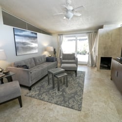 Vacation Living - This comfy sofa at Casa Aralia is a great spot for watching tv or relaxing by the fireplace.
