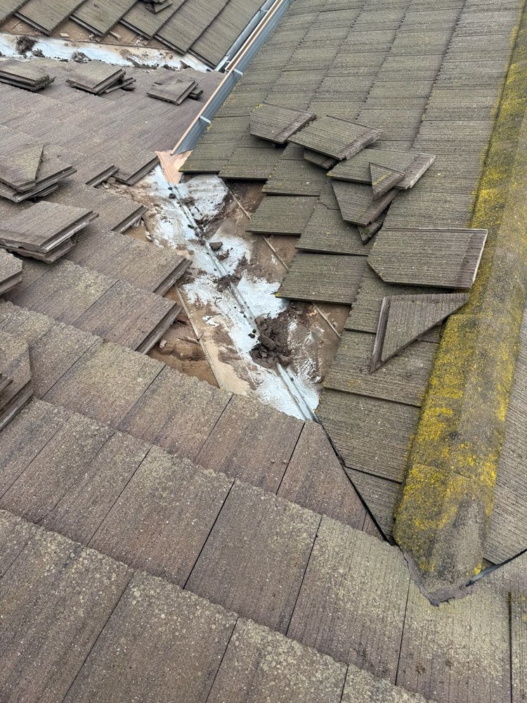 Slide of Maginis Roofing