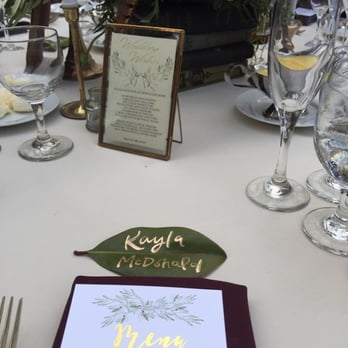 Olive Saint Lily - Gold calligraphy on real magnolia leaves - Graphic Design Near Me Olive Saint Lily - Gold calligraphy on real magnolia leaves - Graphic Design Near Me