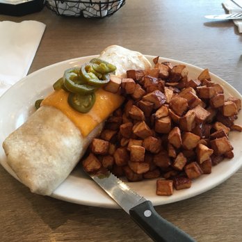 Stacked - Chicken chorizo burrito & diced red potatoes. - Breakfast & Brunch Near Me - Crestwood, Illinois