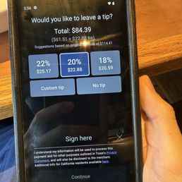 Handheld point of sale with incorrect tipping. Handheld point of sale with incorrect tipping.
