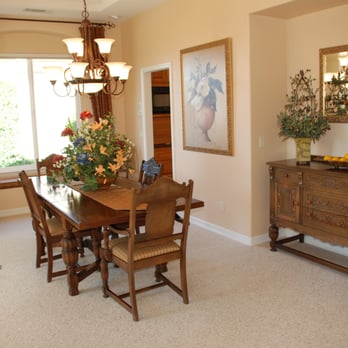 Rancho Interior Design - Antique dining set and buffet, gorgeous chandelier, custom silk draperies and art give this room an updated look. - Interior Design Near Me Rancho Interior Design - Antique dining set and buffet, gorgeous chandelier, custom silk draperies and art give this room an updated look. - Interior Design Near Me