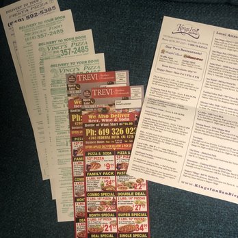 Kings Inn San Diego - Menus shoved under the door and hotel policies. Note the one that says "No menus allowed". - San Diego, CA