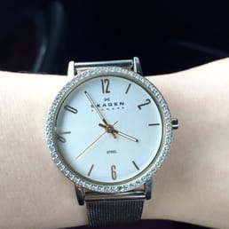 Skagen watch missing numbers after having battery replaced at Karat Plus. Back was also scratched.