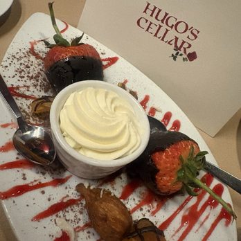 Hugo's Cellar - Fresh chocolate dipped fruit with House made cream - American Near Me - Las Vegas, Nevada