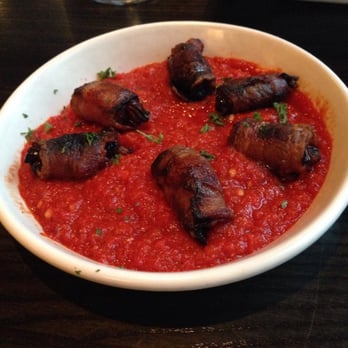 Cento - bacon-wrapped dates stuffed with spicy sausage and piquillo pepper sauce - Italian Near Me - Madison, Wisconsin