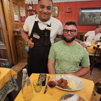 34 - One of our lovely waiters (he played "Take Me Home, Country Roads" after hearing we were visiting from West Virginia) - Seafood Near Me - Rome, RM 34 - One of our lovely waiters (he played "Take Me Home, Country Roads" after hearing we were visiting from West Virginia) - Seafood Near Me - Rome, RM