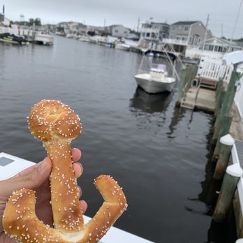 Philly Pretzel Factory - a person holding a pretzel - Bakeries Near Me - Stafford Township, New Jersey Philly Pretzel Factory - a person holding a pretzel - Bakeries Near Me - Stafford Township, New Jersey